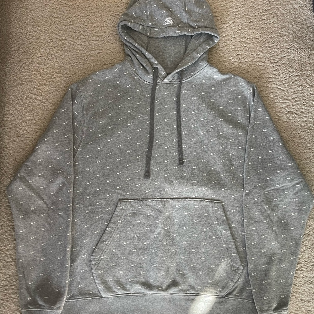 Nike Gray Hoodie with Mini Swoosh Pattern